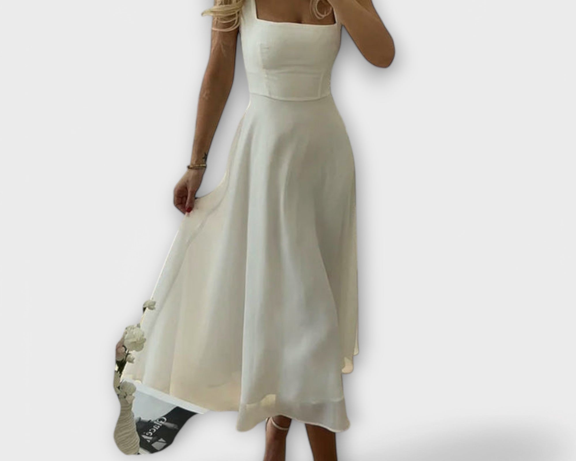 Elegantní bezramenné šaty