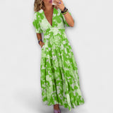 Catrisa - Kvetinový vzor V-krk šaty s kapsami