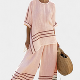 Overal s širokými pruhy a asymetrickým střihem - moderní a pohodlný styl