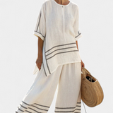 Overal s širokými pruhy a asymetrickým střihem - moderní a pohodlný styl