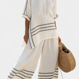 Overal s širokými pruhy a asymetrickým střihem - moderní a pohodlný styl